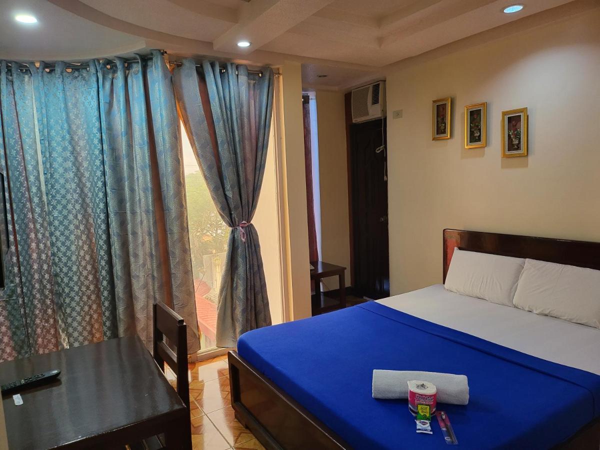 Rooms R Us - Voyagers Palace Puerto Princesa ภายนอก รูปภาพ